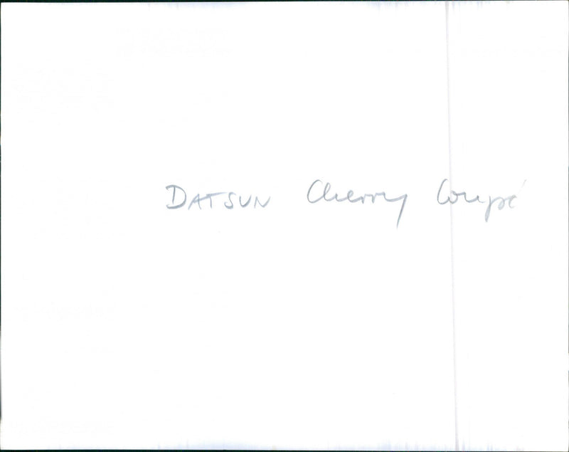 Datsun Cherry Coupe. - Vintage Photograph