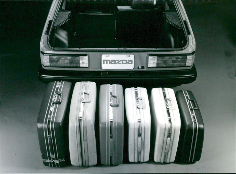 Mazda 323
Sedan - Vintage Photograph