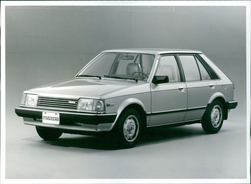 Mazda 323
Sedan - Vintage Photograph