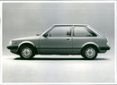 Mazda 323
Sedan - Vintage Photograph