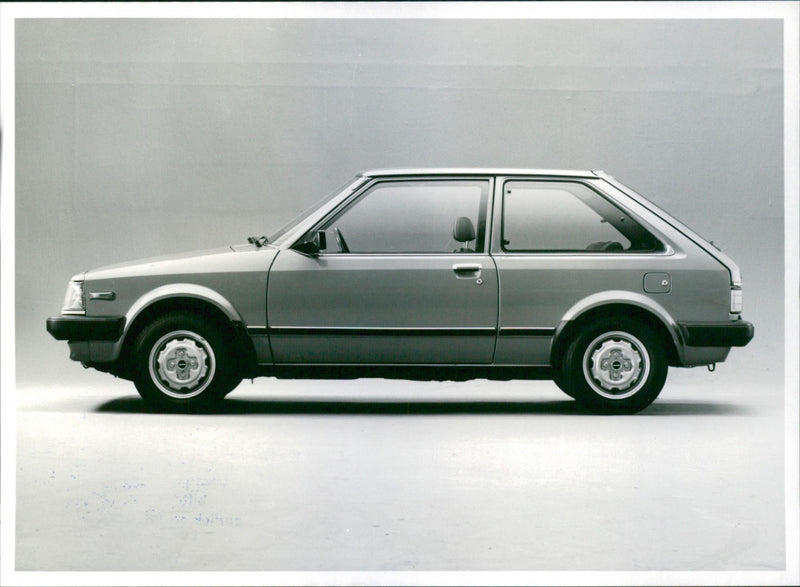 Mazda 323
Sedan - Vintage Photograph