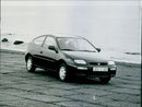 MAZDA 323, 1994 - Vintage Photograph