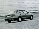 MAZDA 323, 1994 - Vintage Photograph