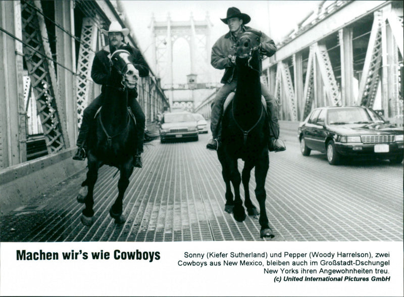 Kiefer Sutherland & Woody Harrelson in "Let's Do It Like Cowboys" - Vintage Photograph