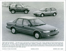 1989 Chevrolet Geo Models: Geo Prizm, Geo Metro, Geo Tracker convertible - Vintage Photograph