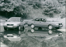 1987 Audi 80 1.8 S (left) / Audi 80 quattro (right) - Vintage Photograph
