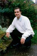 Man in White Sweatshirt - Vintage Photograph