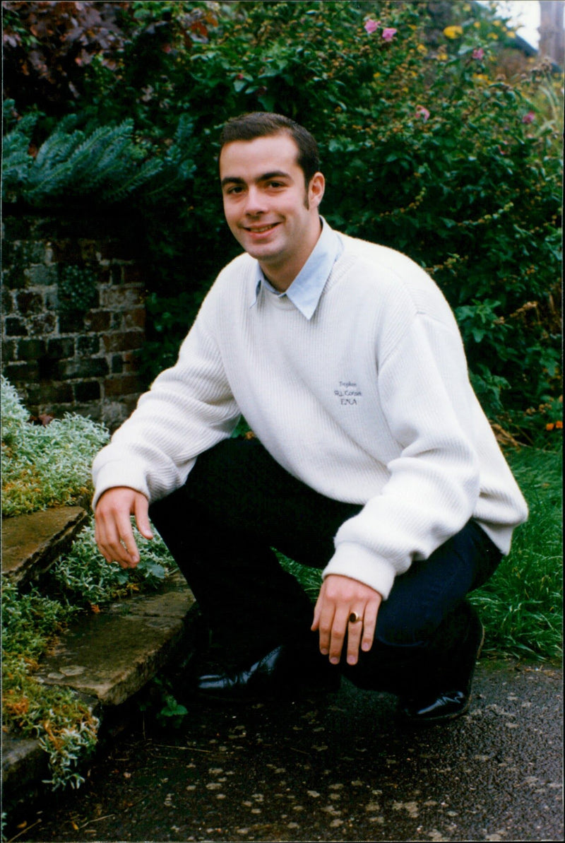 Man in White Sweatshirt - Vintage Photograph