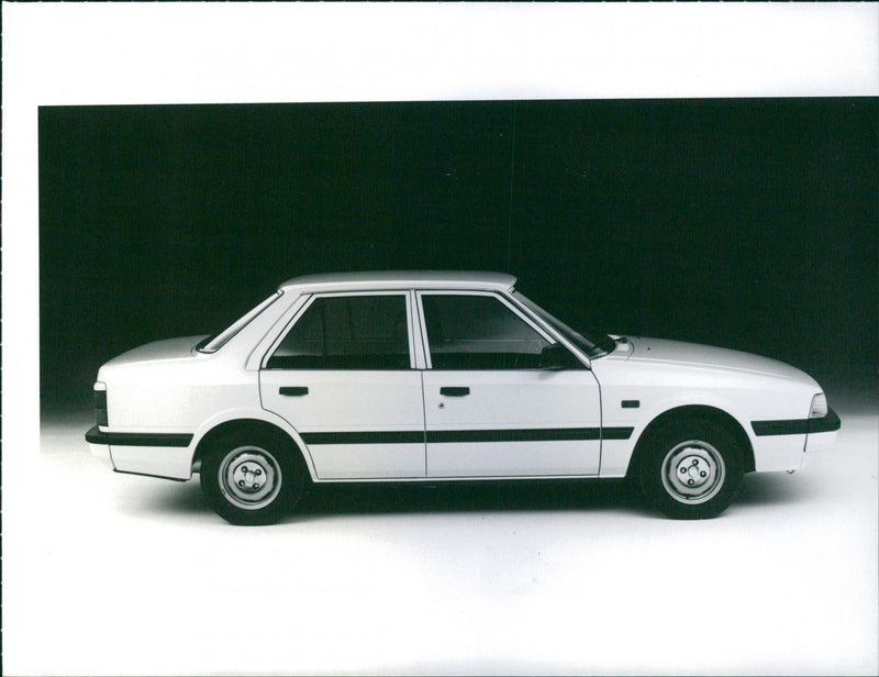 Mazda 626 sedan - Vintage Photograph