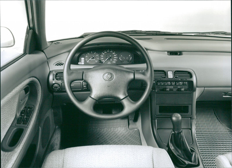 Mazda 626: cockpit with clear and simple, elegant, 1991 - Vintage Photograph
