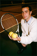 Man holding a tennis racket - Vintage Photograph