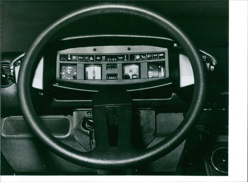 1976 Citroen CX 2200's dashboard and steering wheel - Vintage Photograph