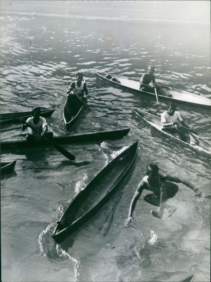 Men in canoes - Vintage Photograph
