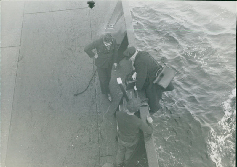 Climbing onto the ship - Vintage Photograph