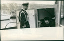 Military officer helping - Vintage Photograph