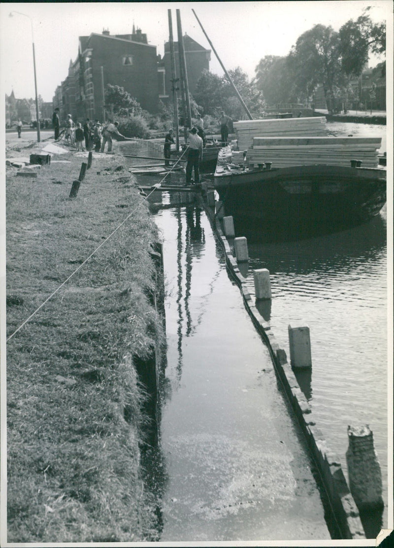 Boat with load of wood - Vintage Photograph