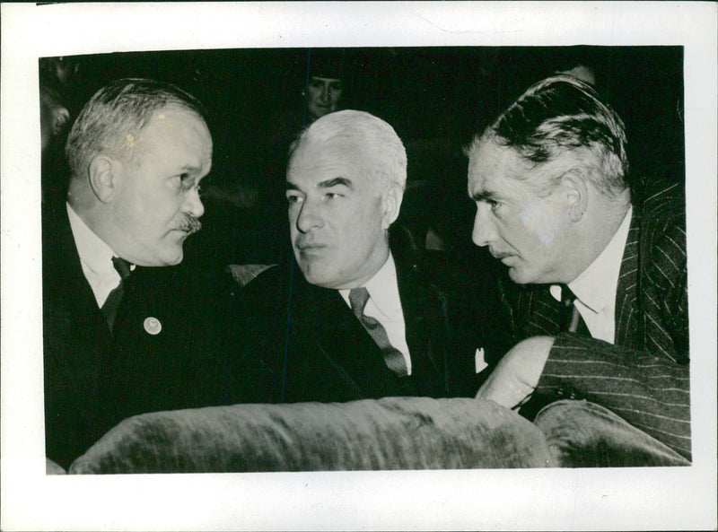 Three men conversing - Vintage Photograph