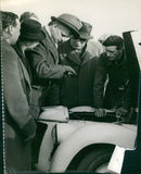 Engine-check of a  Rally car - Vintage Photograph