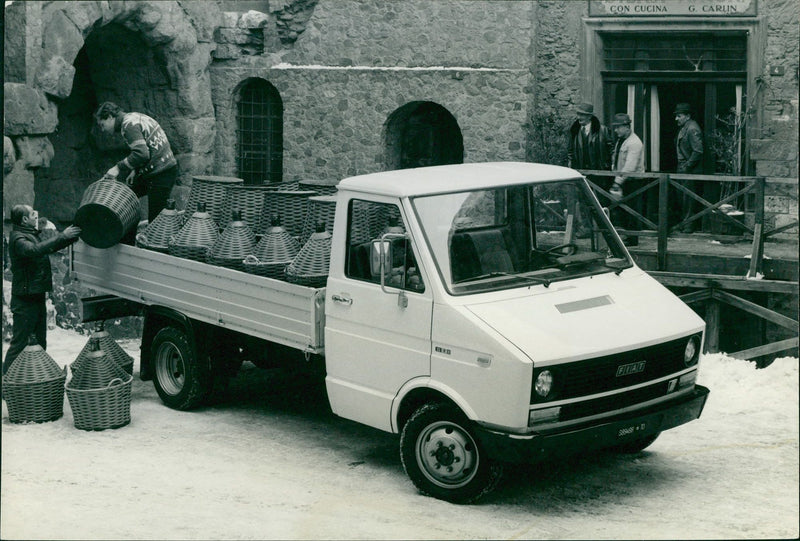 Men unloading a Fiat truck - Vintage Photograph