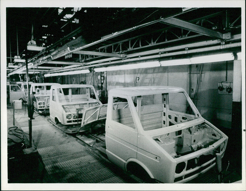 Chassis of Fiat trucks on an assembly line - Vintage Photograph