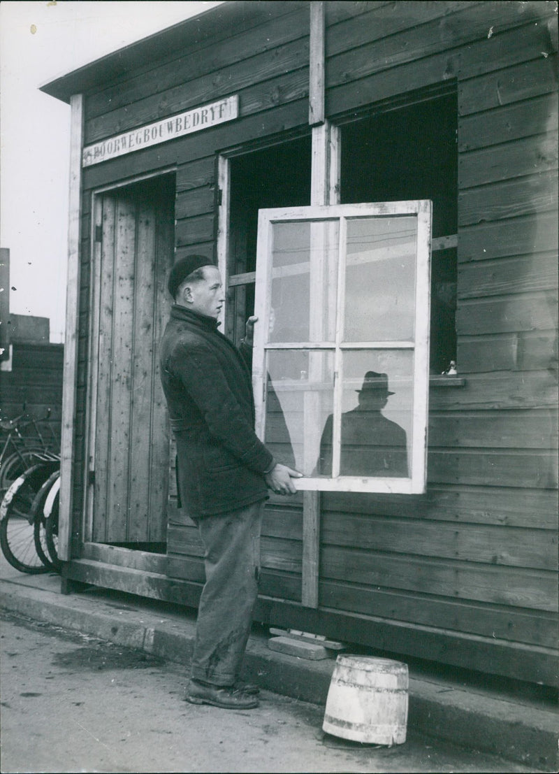 A man holding a window - Vintage Photograph