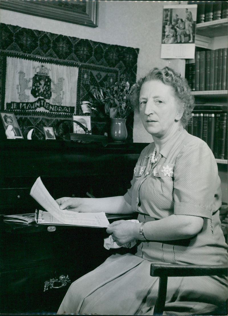 A woman reading a paper - Vintage Photograph
