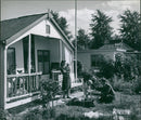 Family playing in the front yard - Vintage Photograph