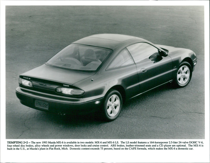 1993 Mazda MX-6, rear view - Vintage Photograph