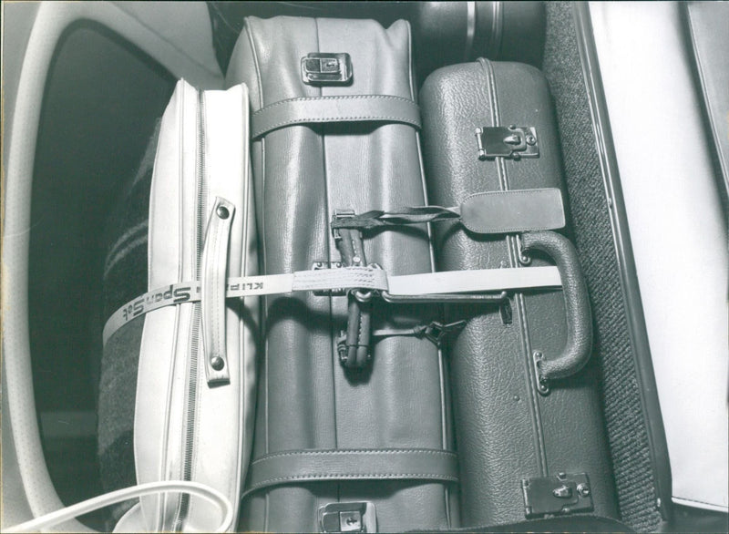 Zipped luggages in the car - Vintage Photograph