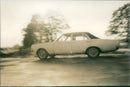 A car on a road test - Vintage Photograph