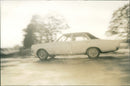 A car on the road - Vintage Photograph