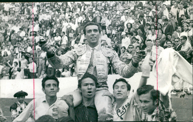 Héctor Villa (El Chano) sitting on shoulders of a fan - Vintage Photograph