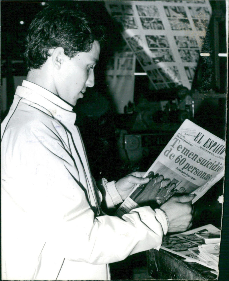 Cesar Rincon holding the newpaper - Vintage Photograph