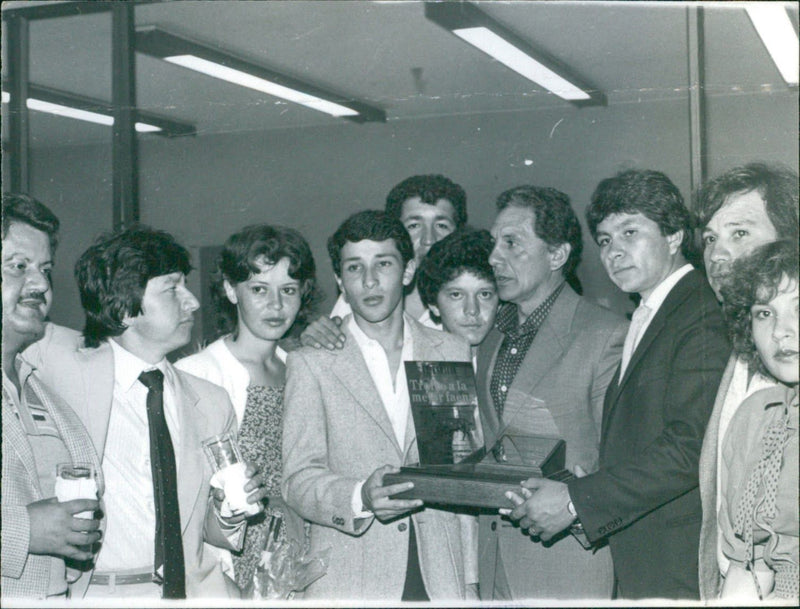 Cesar Rincon accepting a trophy. - Vintage Photograph