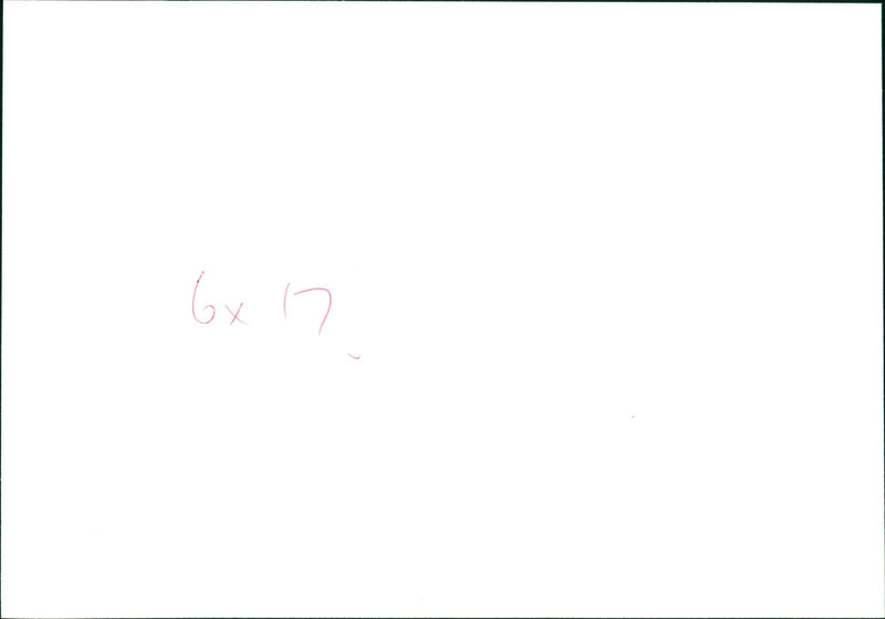 Man poses beside sculpture - Vintage Photograph