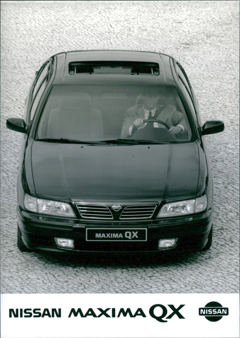 Nissan Maxima QX. - Vintage Photograph