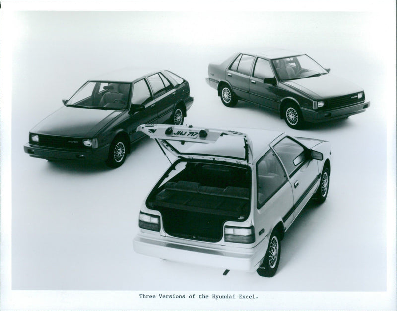 Three Versions of the Hyundai Excel - Vintage Photograph