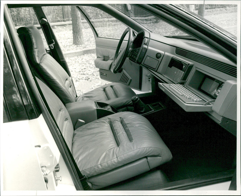 Car with a computer on the dashboard - Vintage Photograph