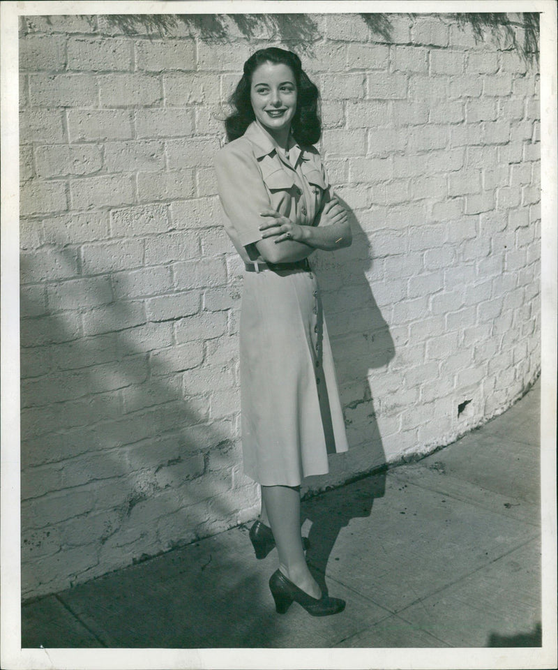 Female model wearing Button-down dress - Vintage Photograph