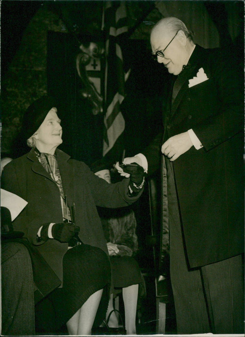 Mr. Churchill show the Medal to his wife. - Vintage Photograph