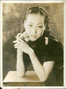 A model posing in front of the camera - Vintage Photograph