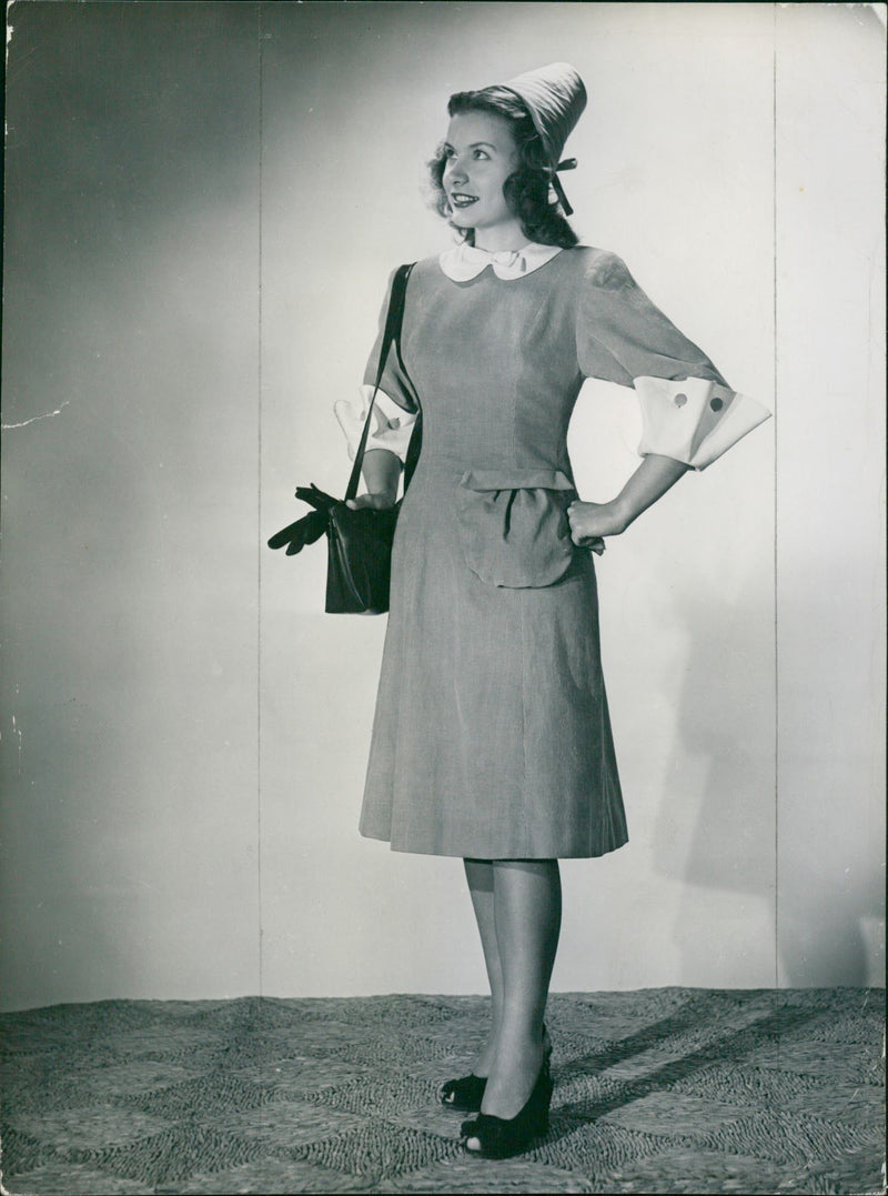 Woman in dress and hat - Vintage Photograph