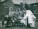 Showing a chicken - Vintage Photograph