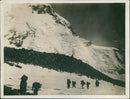 Mountaineers climbing in snowy mountains - Vintage Photograph
