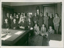 Group of men and women posing in an office - Vintage Photograph