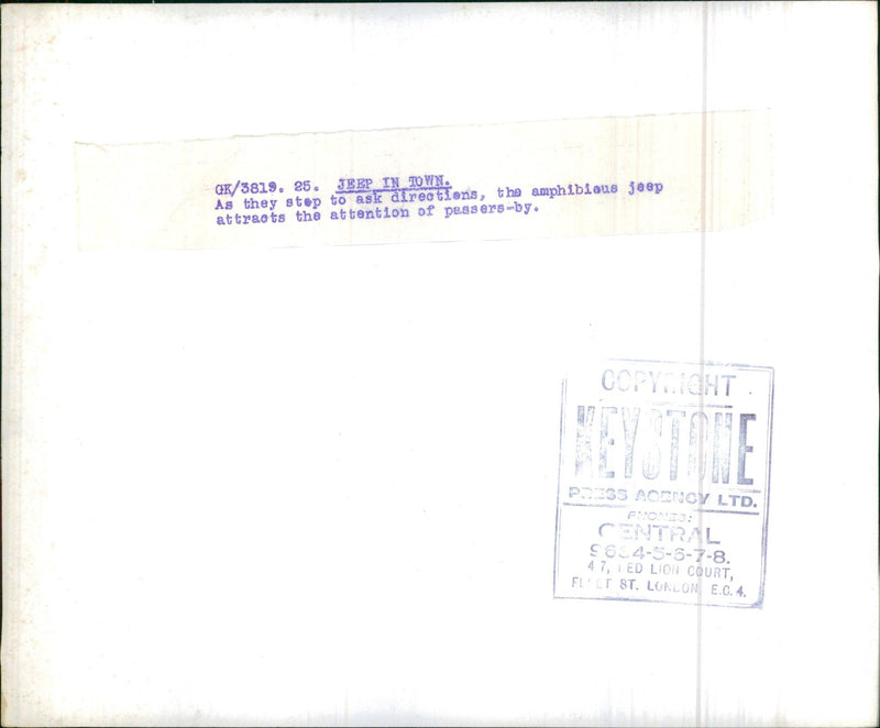 Jeep in town. - Vintage Photograph