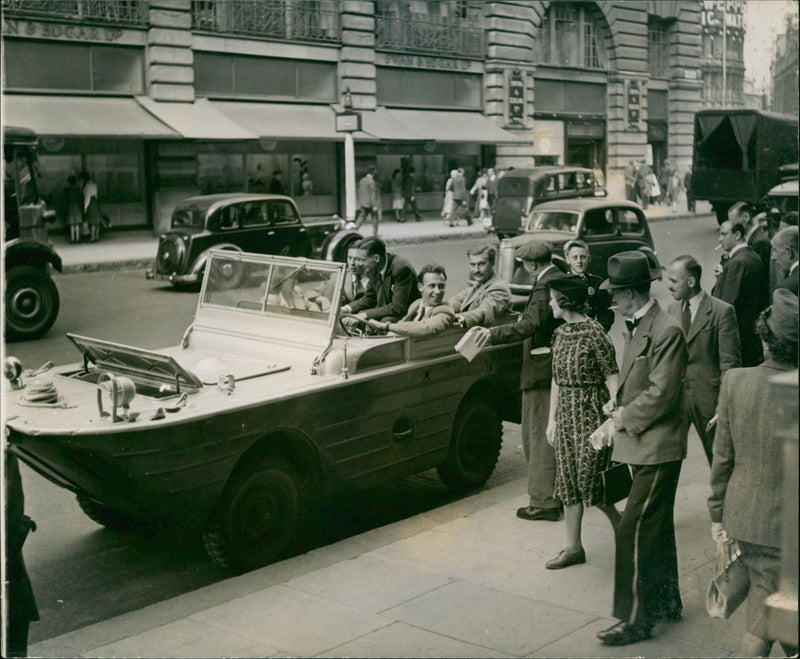 Jeep in town. - Vintage Photograph