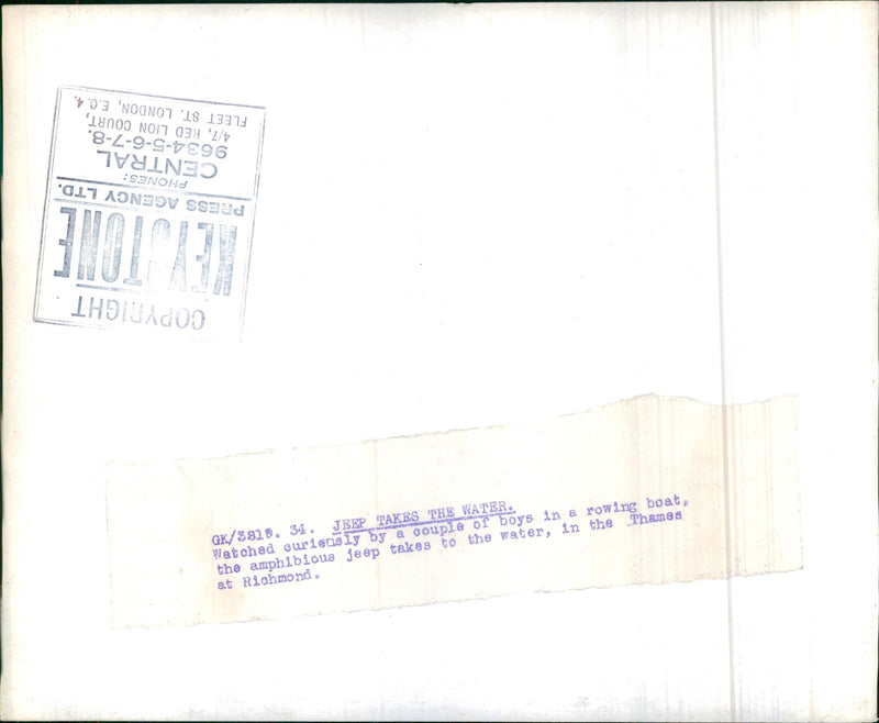 Jeep takes the water. - Vintage Photograph