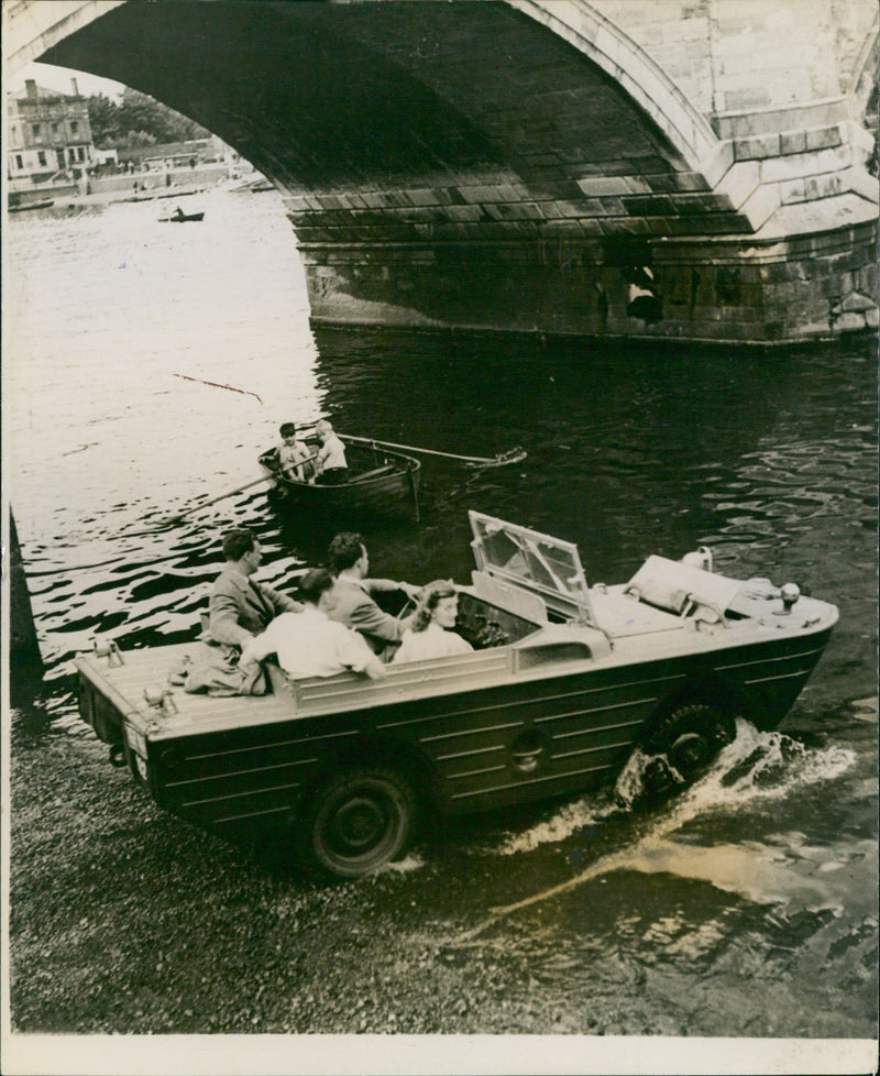 Jeep takes the water. - Vintage Photograph