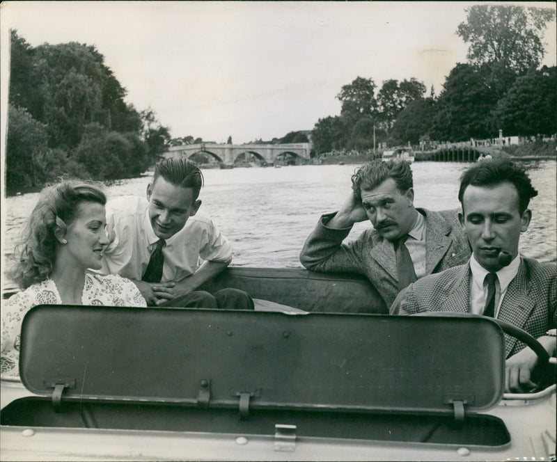 Cruising on the water in the jeep. - Vintage Photograph